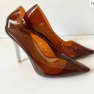 Woman clear high heel shoe
